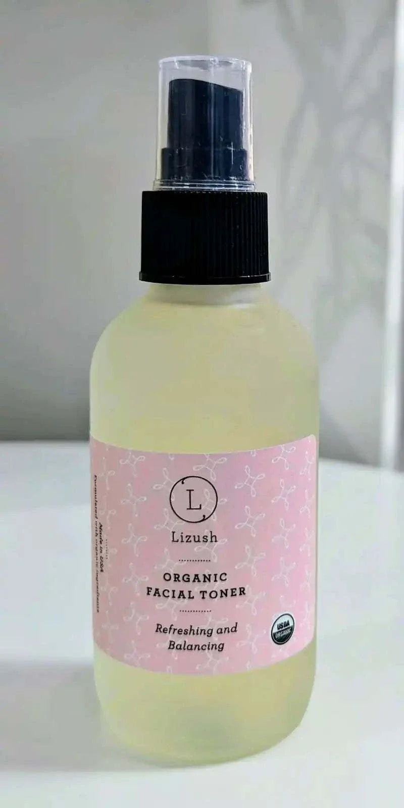 Organic Facial Toner by Lizush in spray bottle with pink label, USDA certified organic and natural ingredients