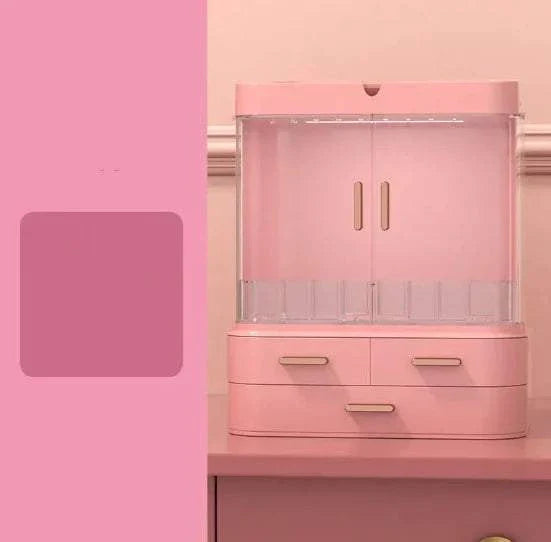 Pink desktop jewelry and skincare organizer with multiple compartments and drawers for cosmetics and accessories storage