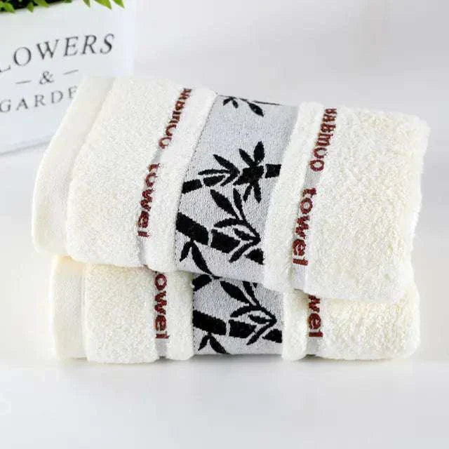 Soft absorbent bamboo fiber towels with black leaf design and eco-friendly cotton blend