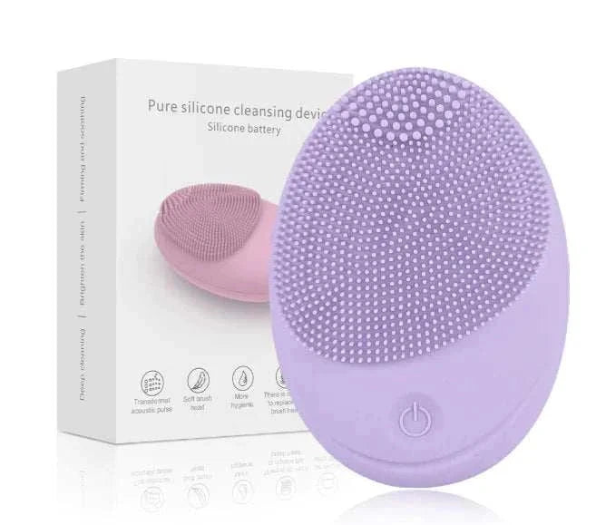 Compact ultrasonic plastic device for facial cleansing in violet with silicone bristles and power button