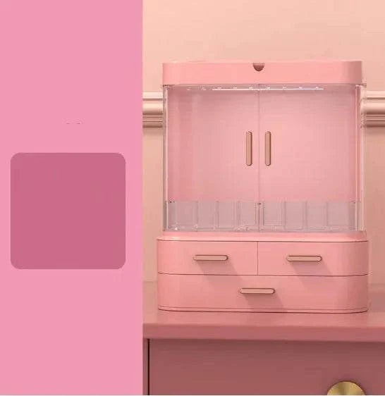 Pink desktop jewelry and skincare organizer with multiple compartments and drawers for cosmetics and accessories
