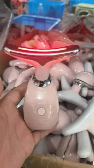 Handheld Neck Beauty Instrument with LED heat therapy and ergonomic design for skin firming and fine line reduction