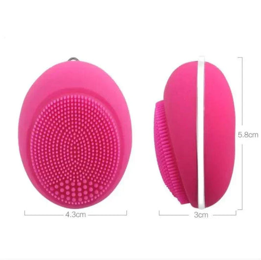 Compact pink ultrasonic plastic device face wash brush with silicone bristles, 5.8cm x 4.3cm x 3cm dimensions