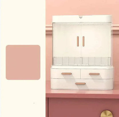 Compact desktop jewelry and skincare organizer with drawers and covered compartments for cosmetics and essentials storage