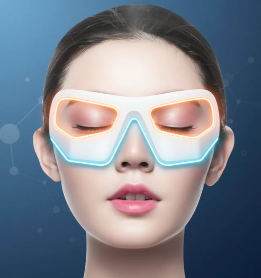 Woman wearing white beauty eye massage device for dark circles and puffiness treatment