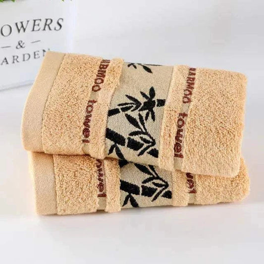 Soft thick bamboo fiber towels in khaki with black leaf pattern, eco-friendly and absorbent bath towels